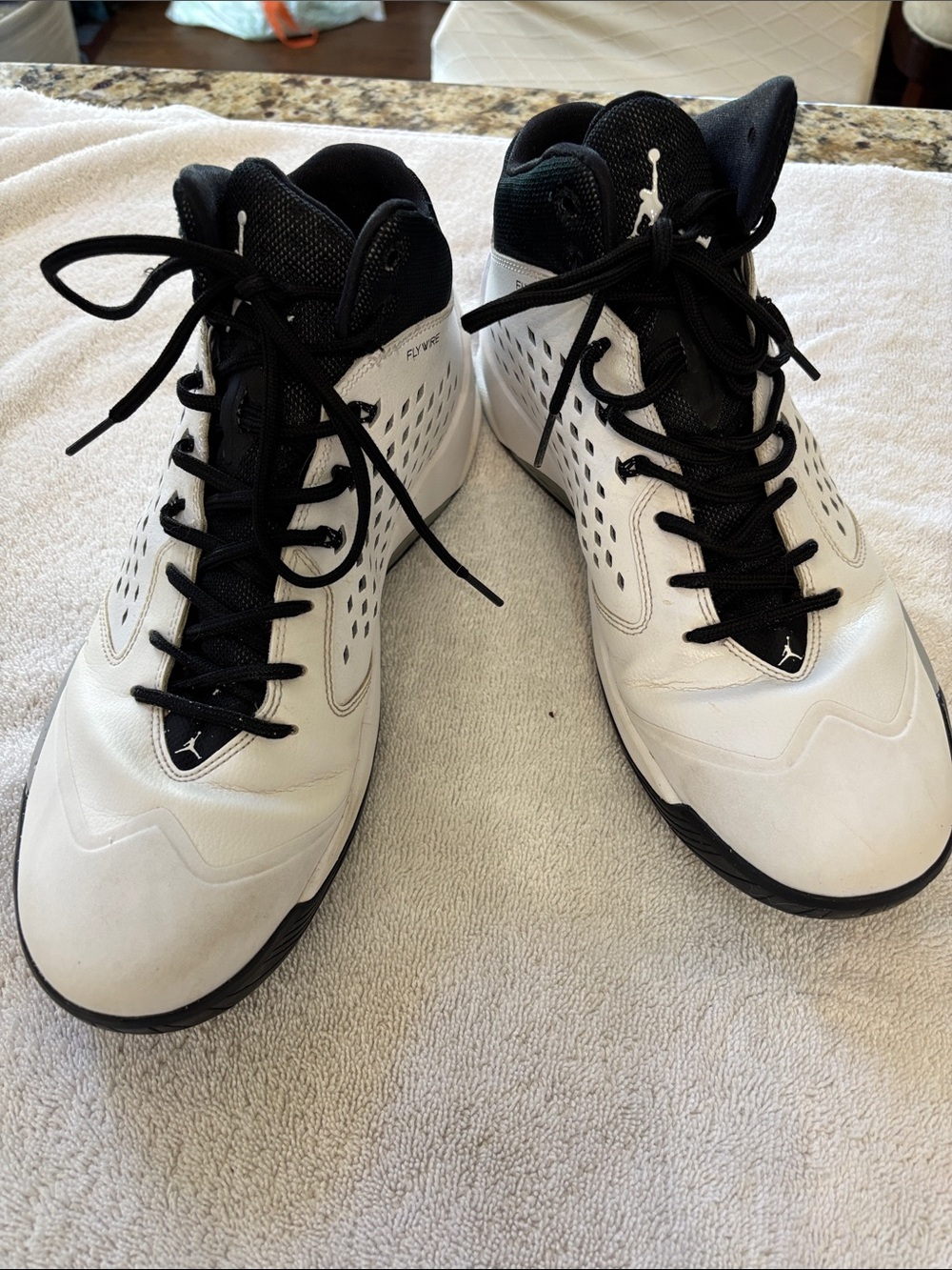 Jordan Men’s High-Top Sneakers in White and Black